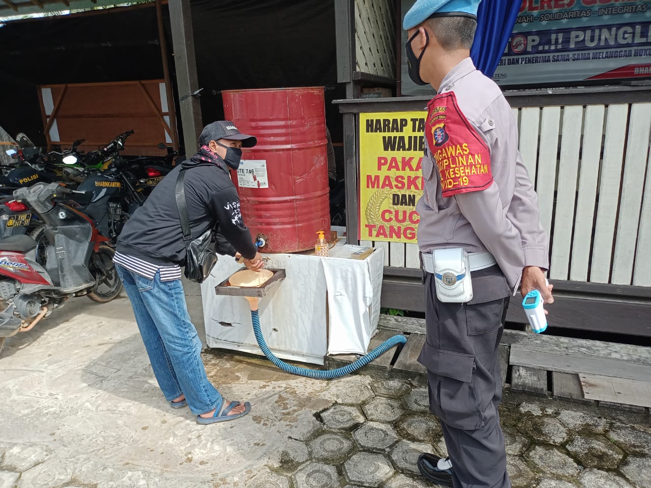 Cek Suhu Tubuh dan Cuci Tangan Jadi Kewajiban