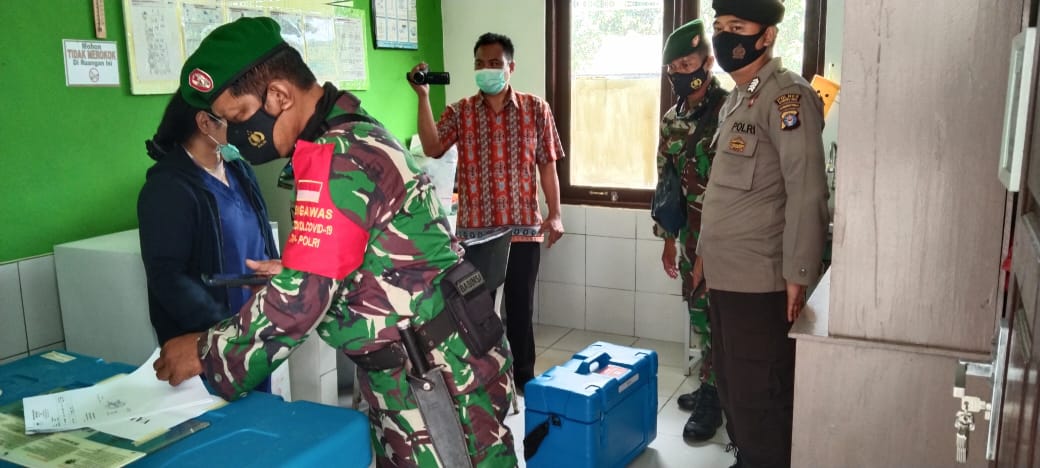 Polsek Tewah Kawal Proses Vaksinasi