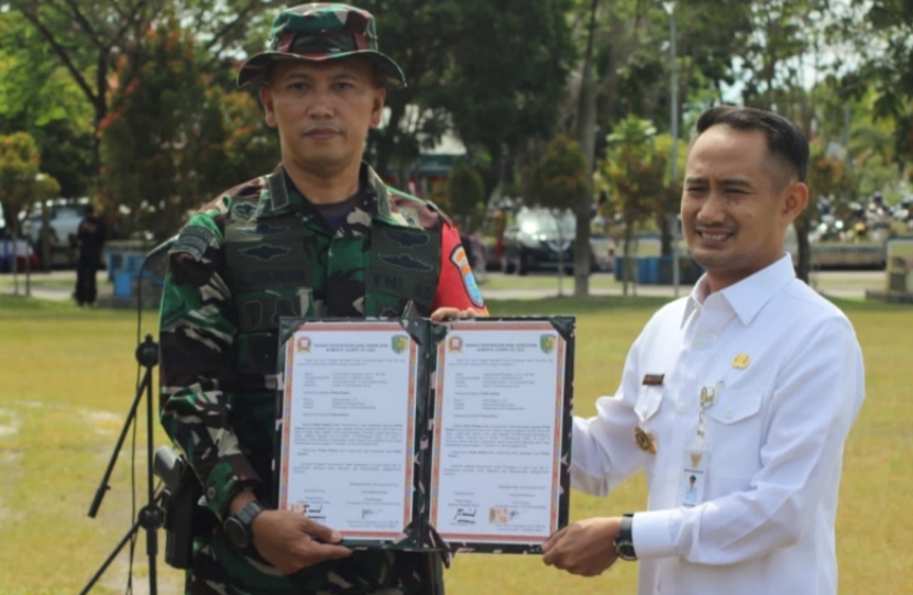 TMMD Petuk Katimpun Resmi Ditutup,  Dandim 1016/Plk dan Walikota Tanda Tangani Berita Acara Serah Terima